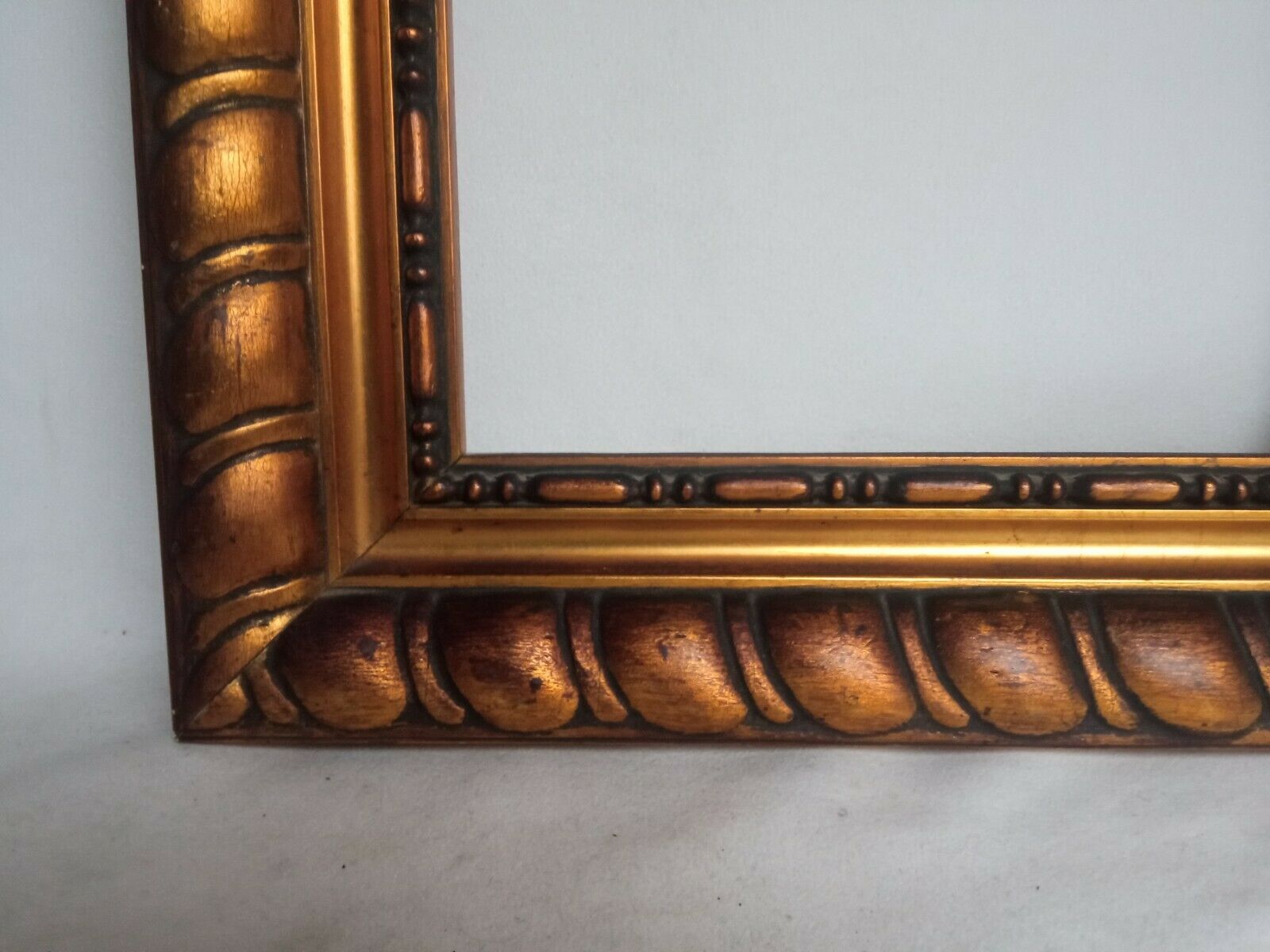 Wooden frame and gilded stucco circa 1900