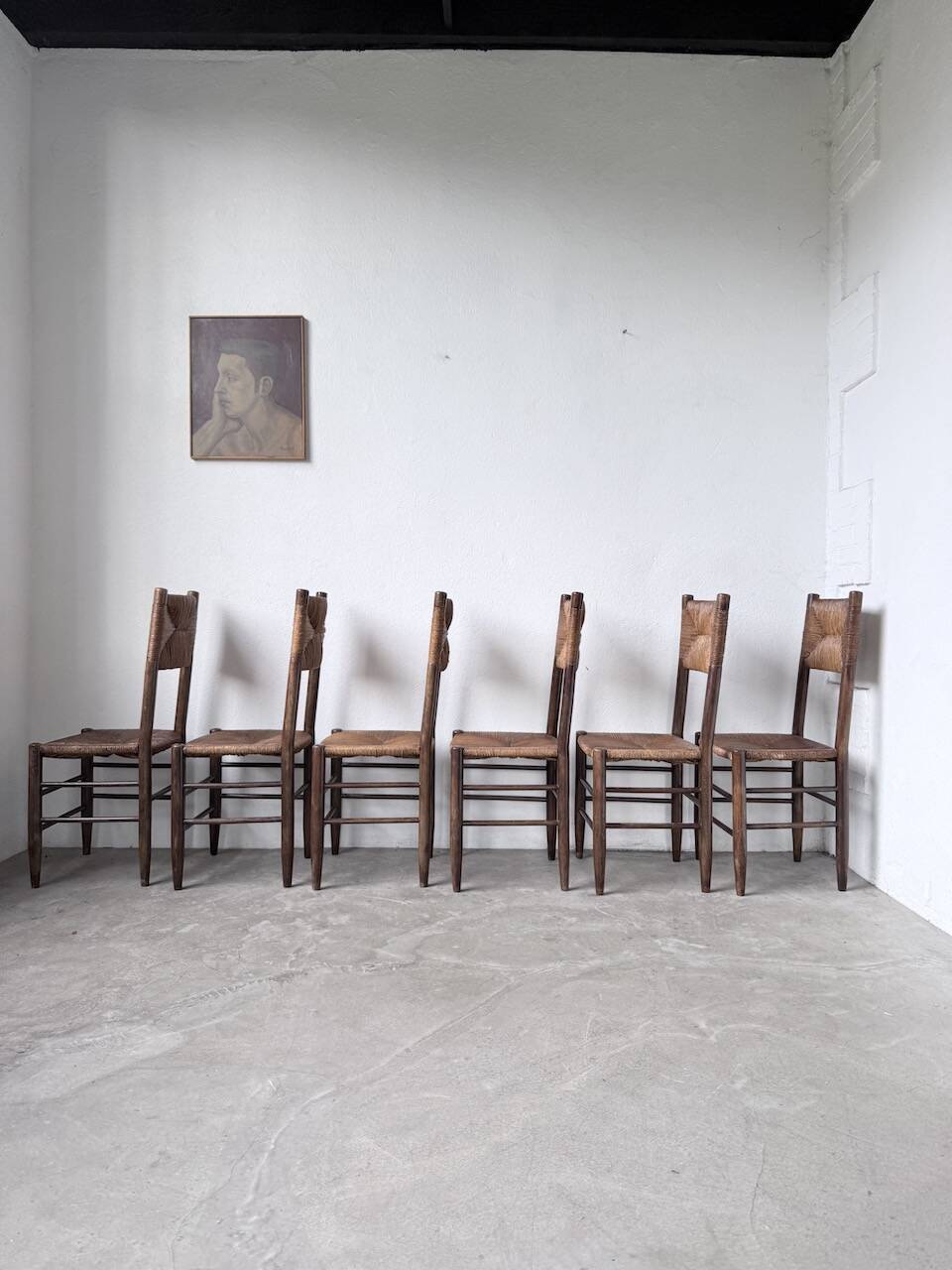 Set of 6 straw and oak Beauche chairs.