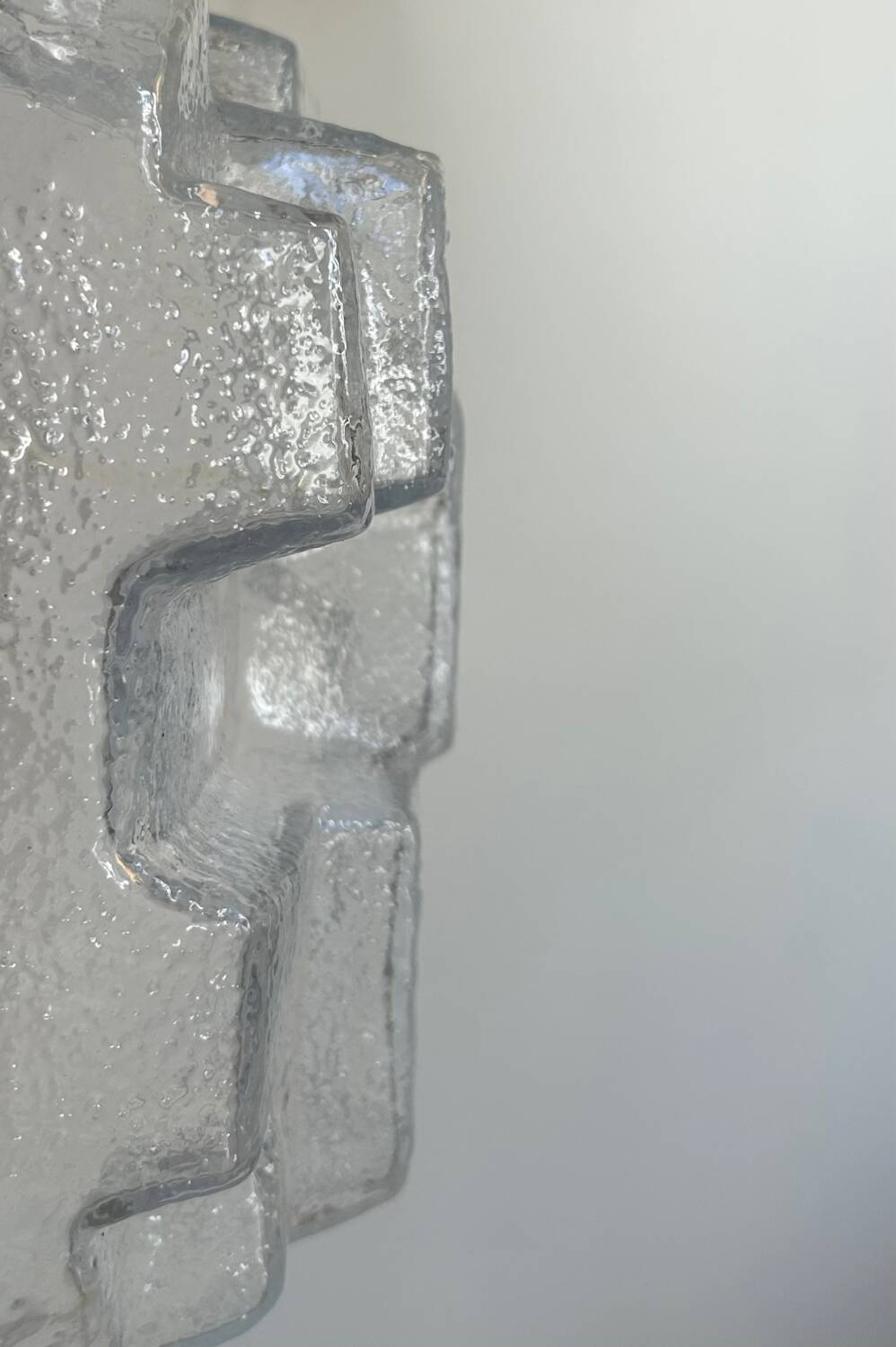 Vintage wall lamp in pressed molded bubble glass, France 1960