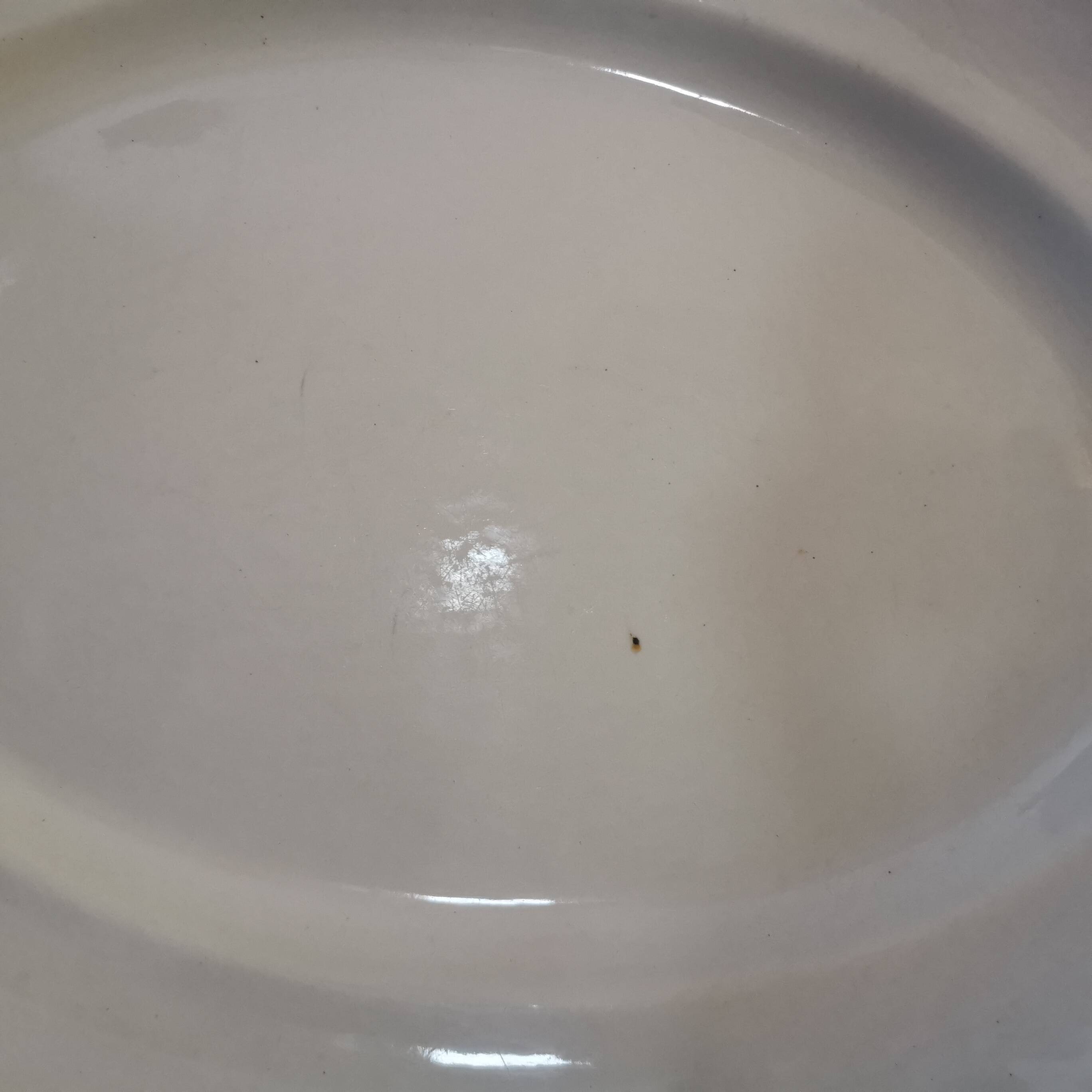 Oval white earthenware dish stamped K&G, Lunéville