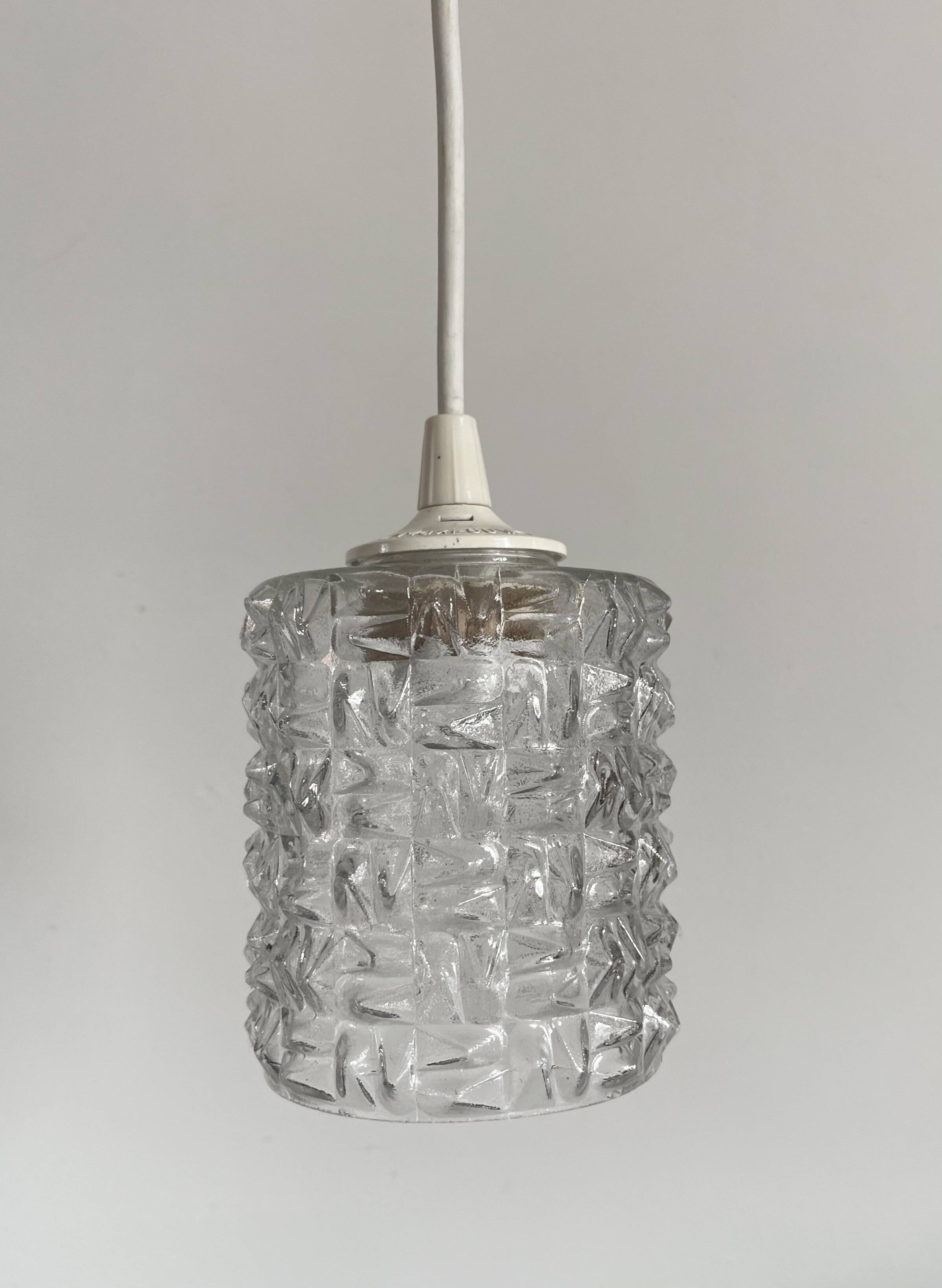 Small cylindrical molded glass pendant light