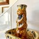 Enamelled ceramic candle holder