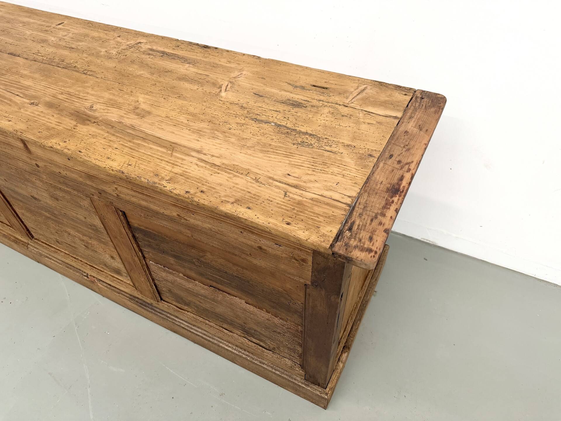 Very large pine trade counter, circa 1920.