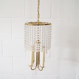 Lustre quatre flammes avec perles de verre laiton