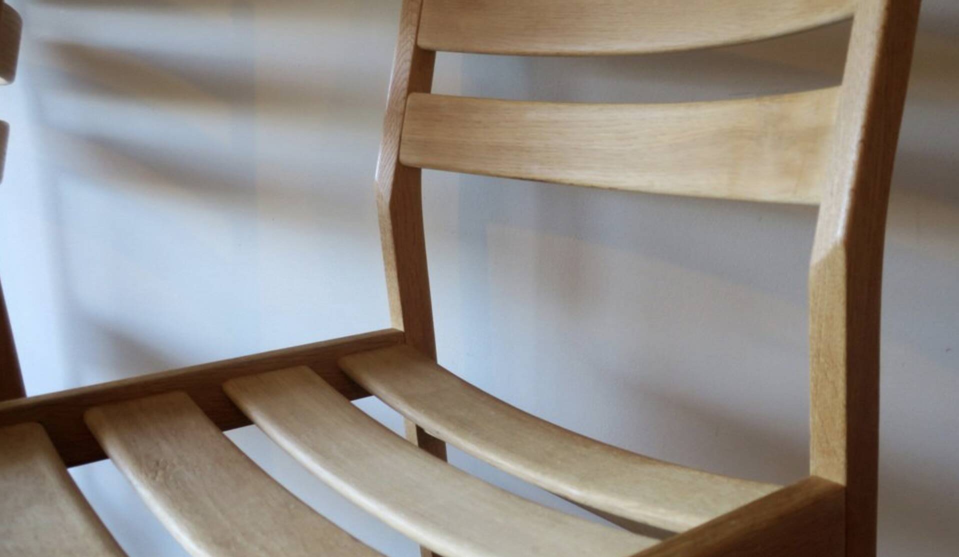 Pair of solid ash wide-seat dining chairs by Kurt Ostervig for KP Mobler, Denmark 1950s