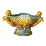 Old pot large slurry head bow of boat planter shell scallops