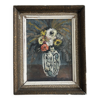 Vintage painting of flowers in a vase.