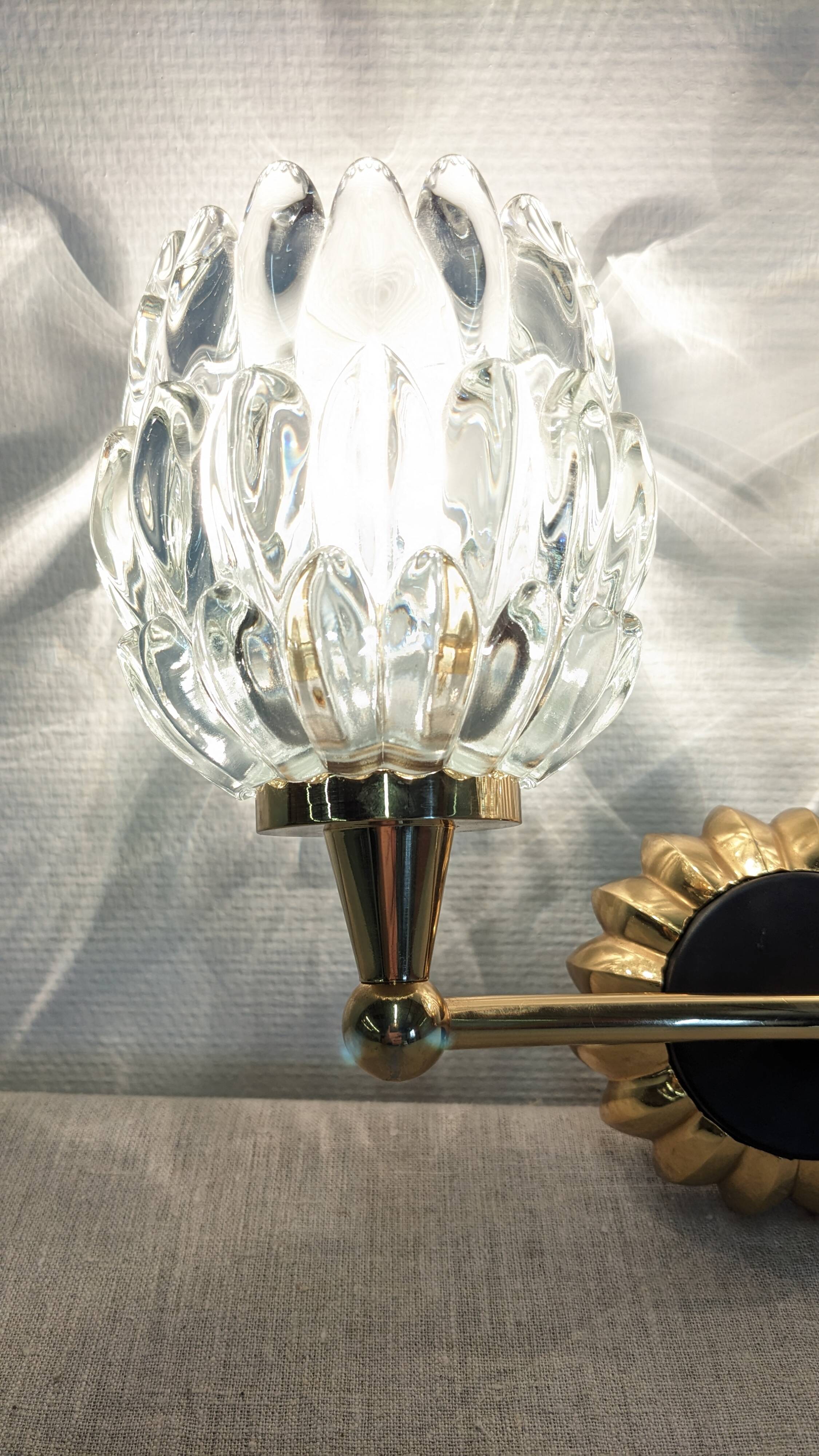 Set of 4 modernist double wall lights by Maison Arlus, France circa 1950.