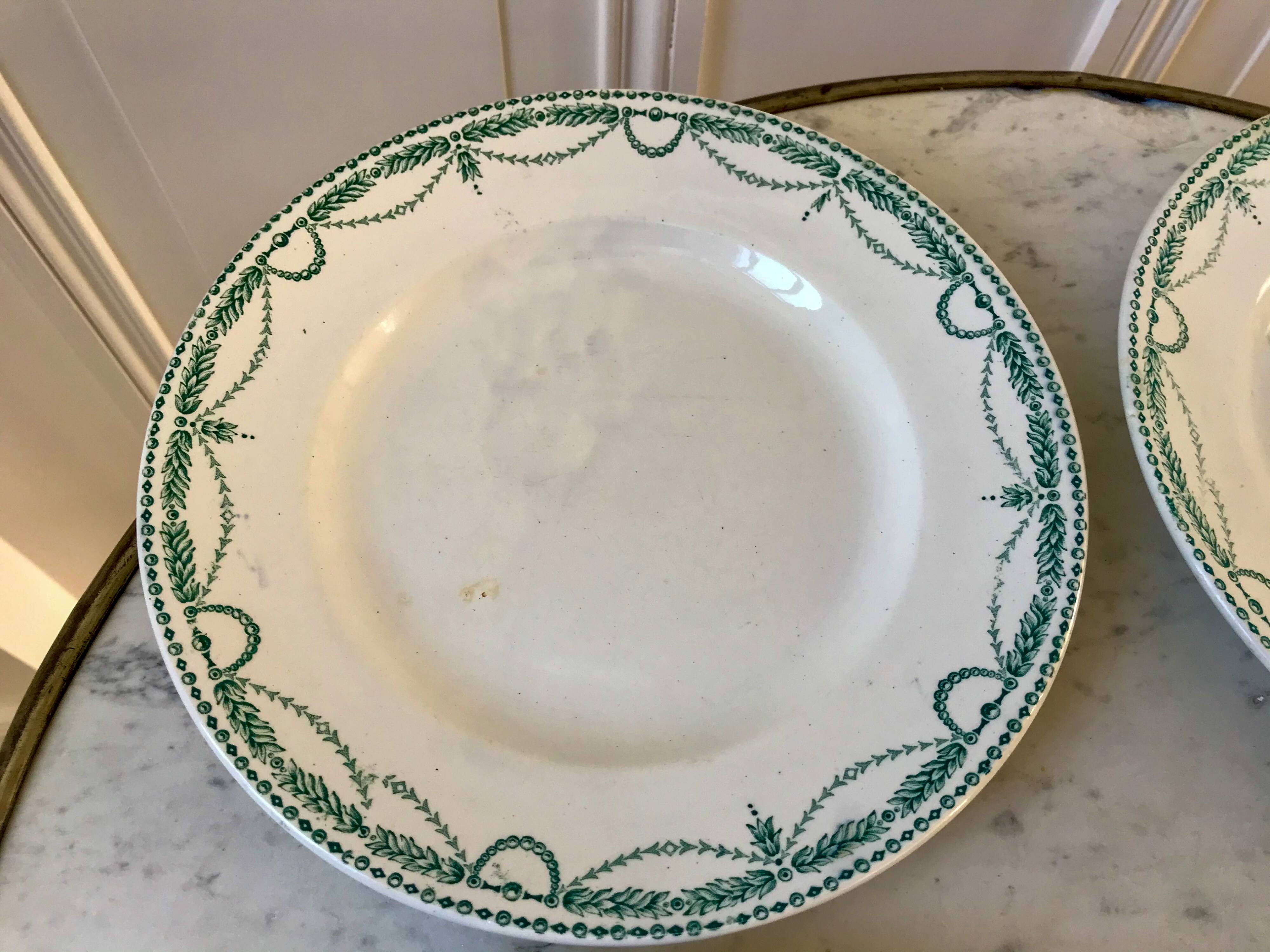 set of 4 flat plates in Terre de Fer Saint Amand model René 19th century