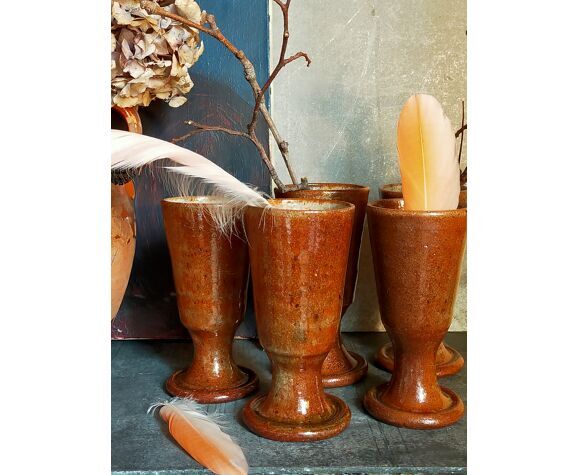 Five ancient potter's mazagrans in enamelled sandstone