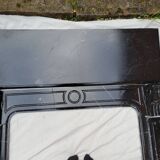 Pompadour fireplace with black marble modillions