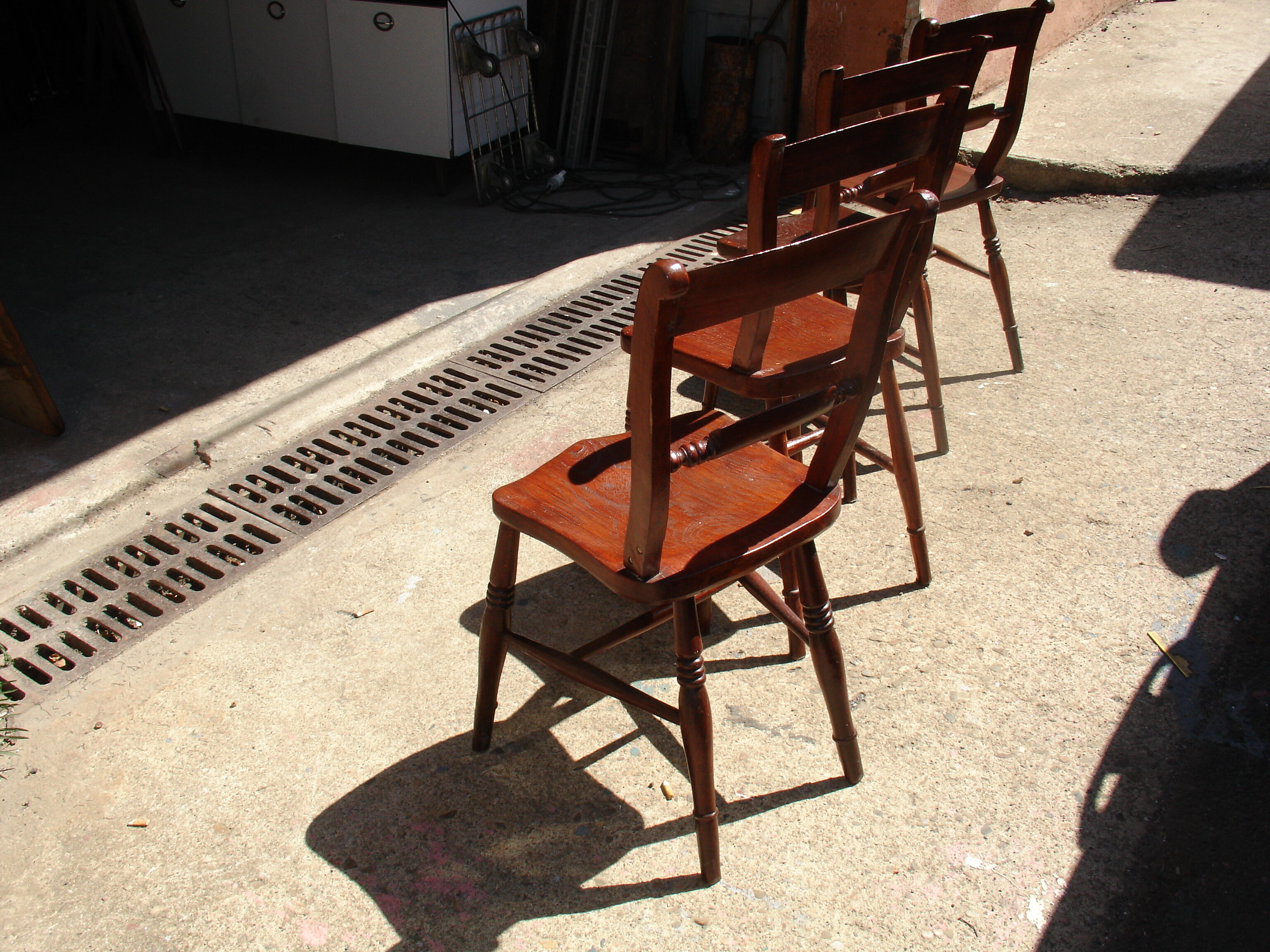 Set of 4 chairs in the style of 19th-century English Admiralty chairs, made of solid elm.