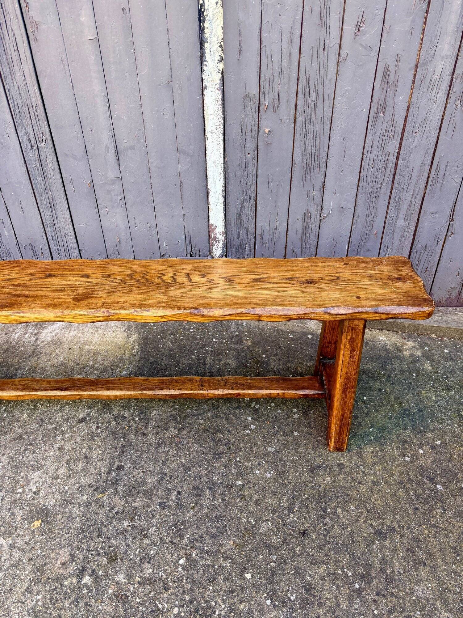 Brutalist bench in dark wood