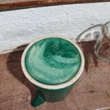 Small malachite green pitcher signed Poët Laval
