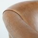 Characterful club chair made of sheepskin leather with light cognac colours