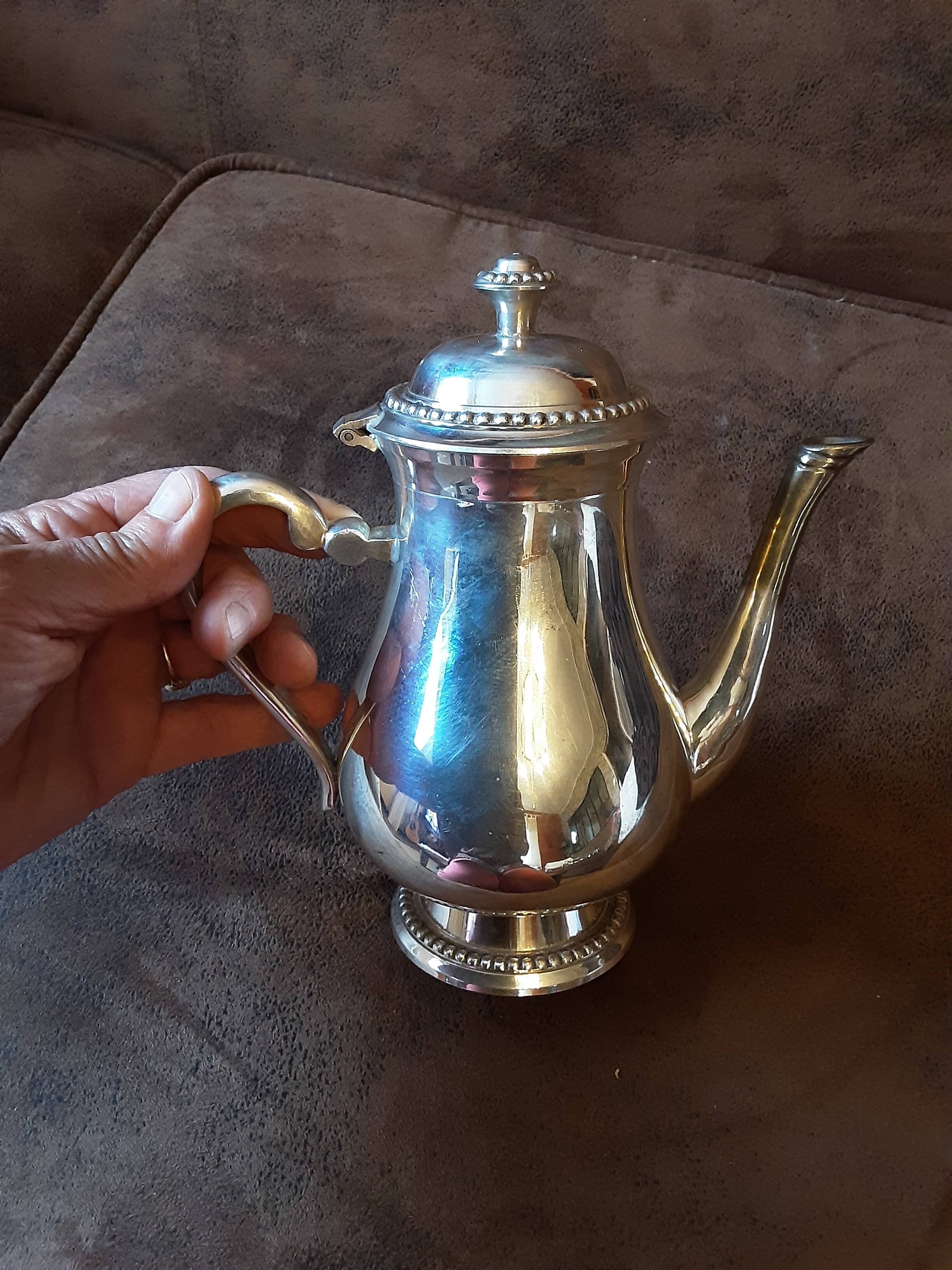Silver metal teapot