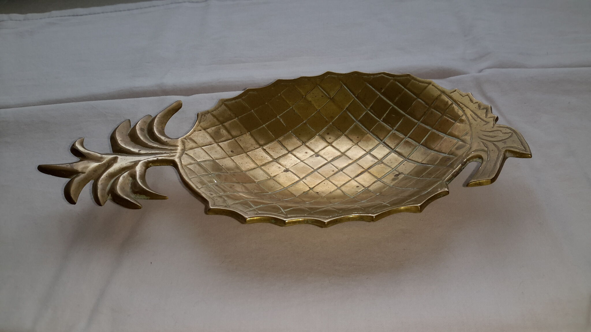 Empty pocket pineapple brass