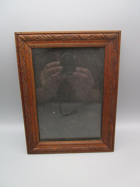 Old frame in worked wood