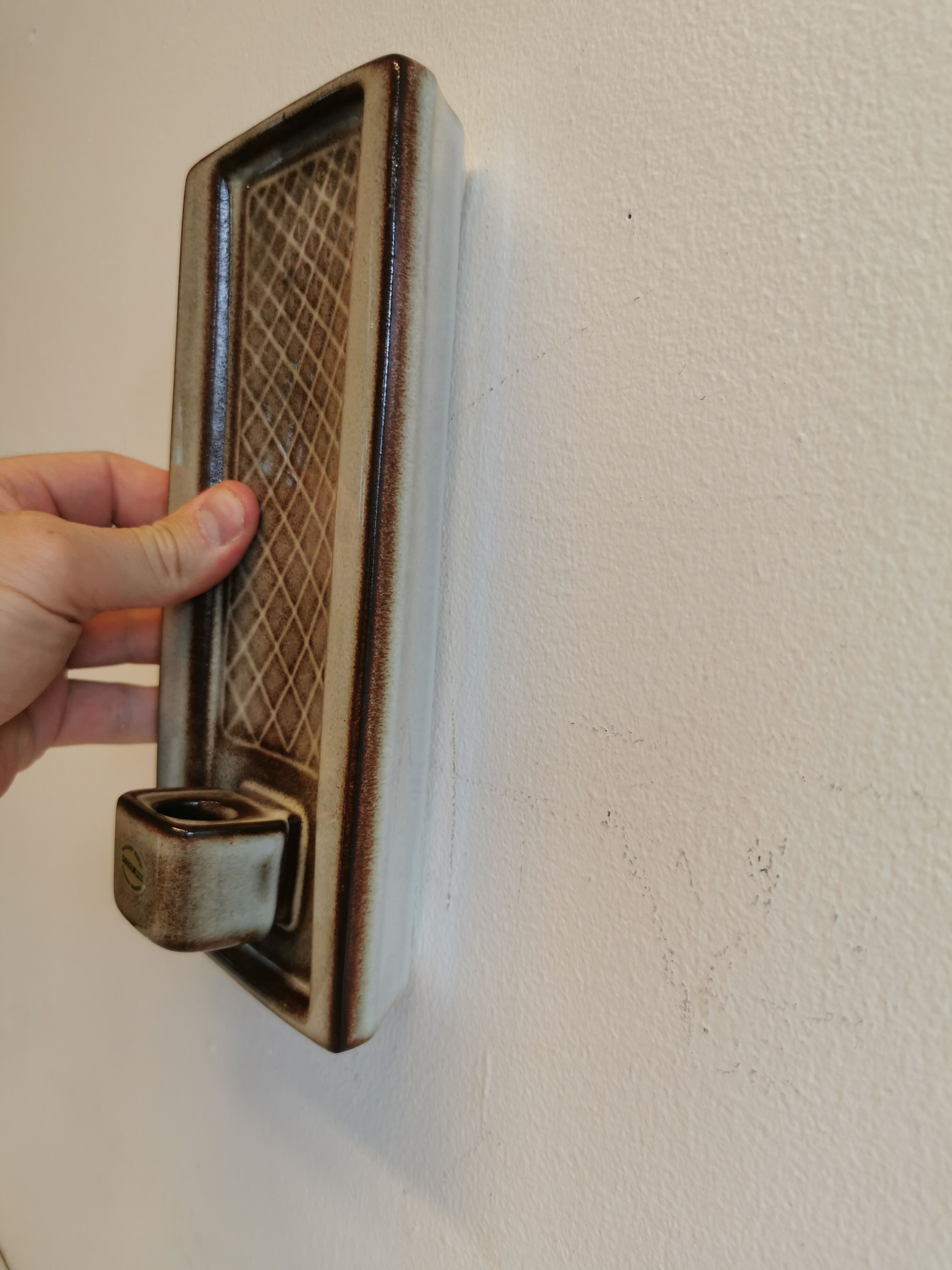 Wall-hung candle holder in ceramic, from Danske Søholm, estimated 1960s.