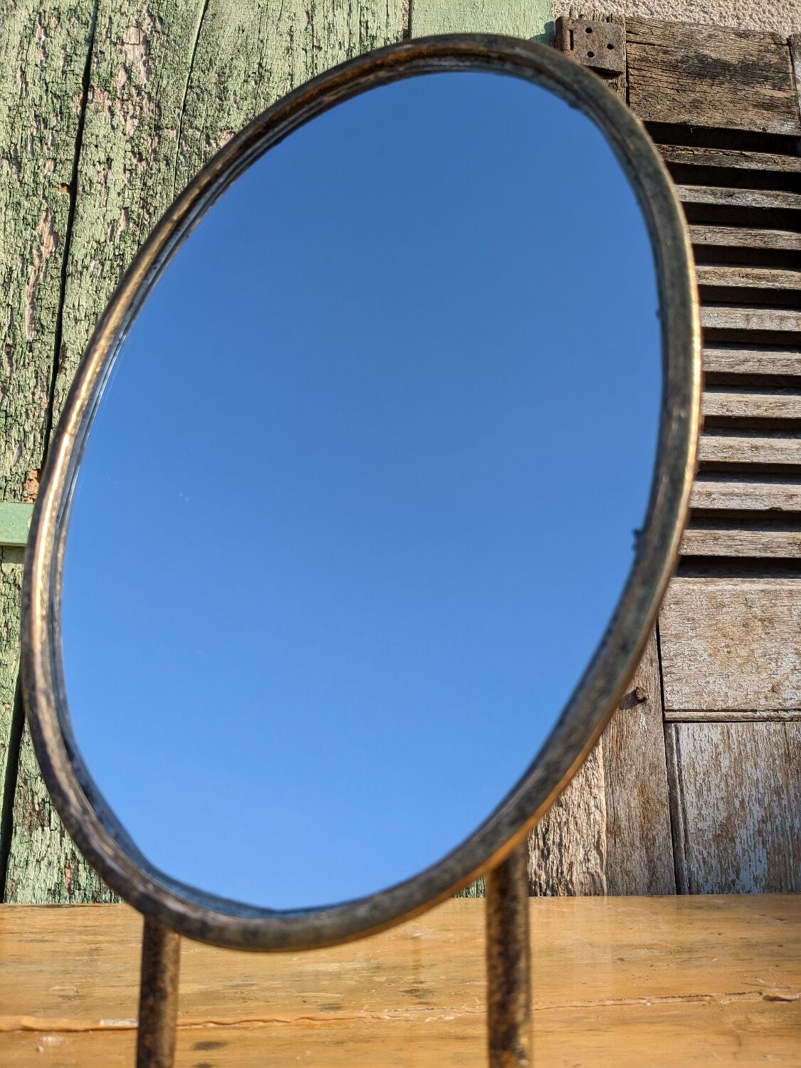 Metal mirror with duck legs