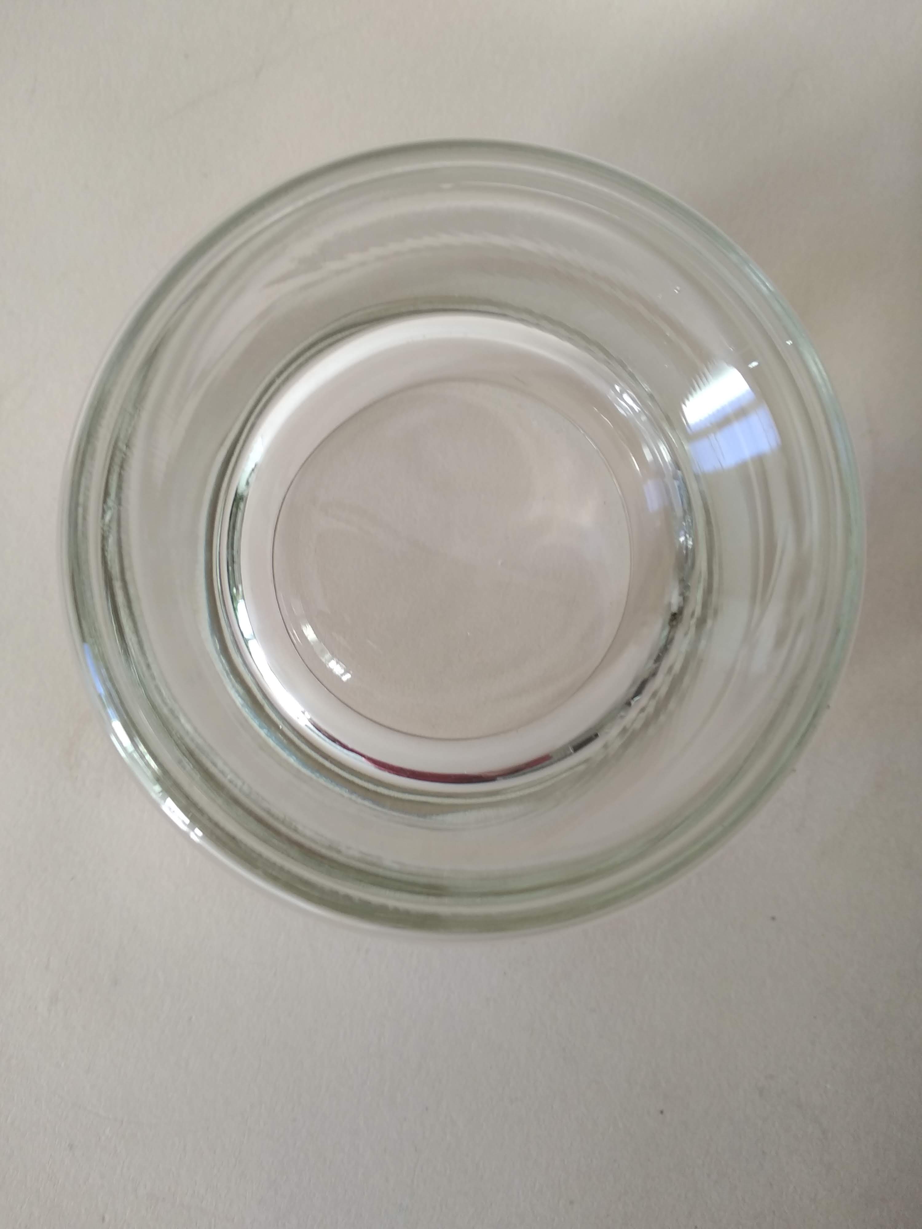 Glasses cups with thick bottom with water or vintage spirits 70