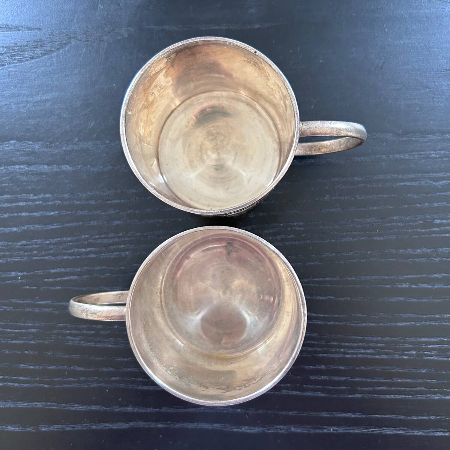 Pair of chiseled silver cups