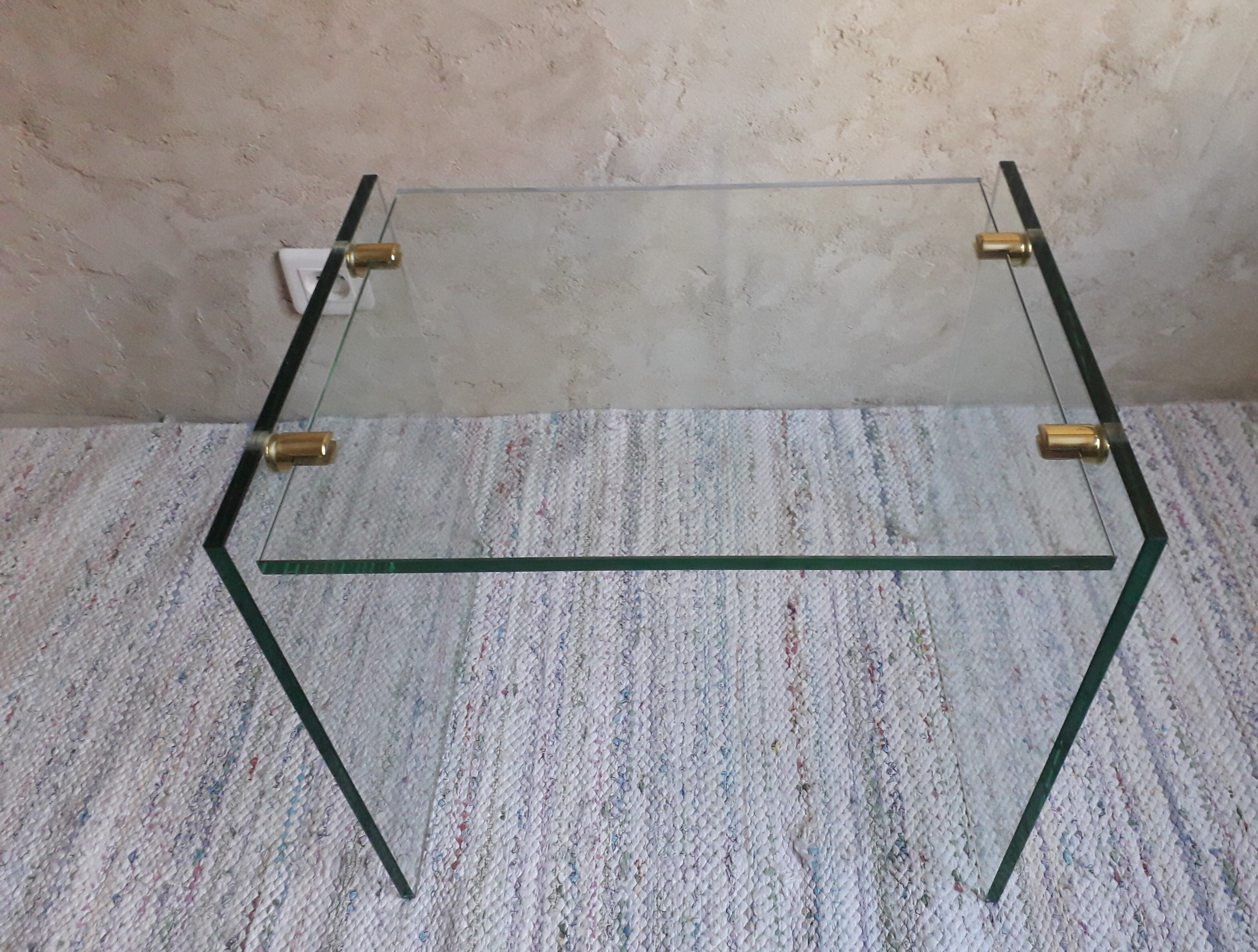 Glass and brass coffee table