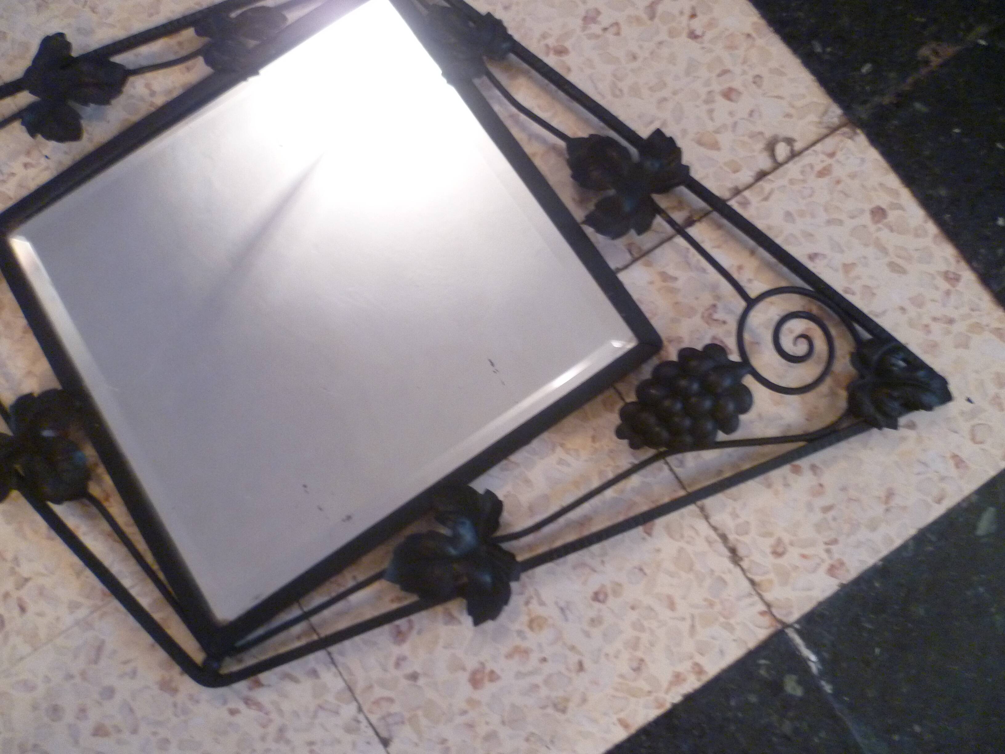 Art deco beveled mirror in wrought iron with grape decor