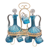 Cabaret Portieux liqueur service with 10 blue and clear glasses.