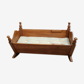 Old Alsatian style cradle bed