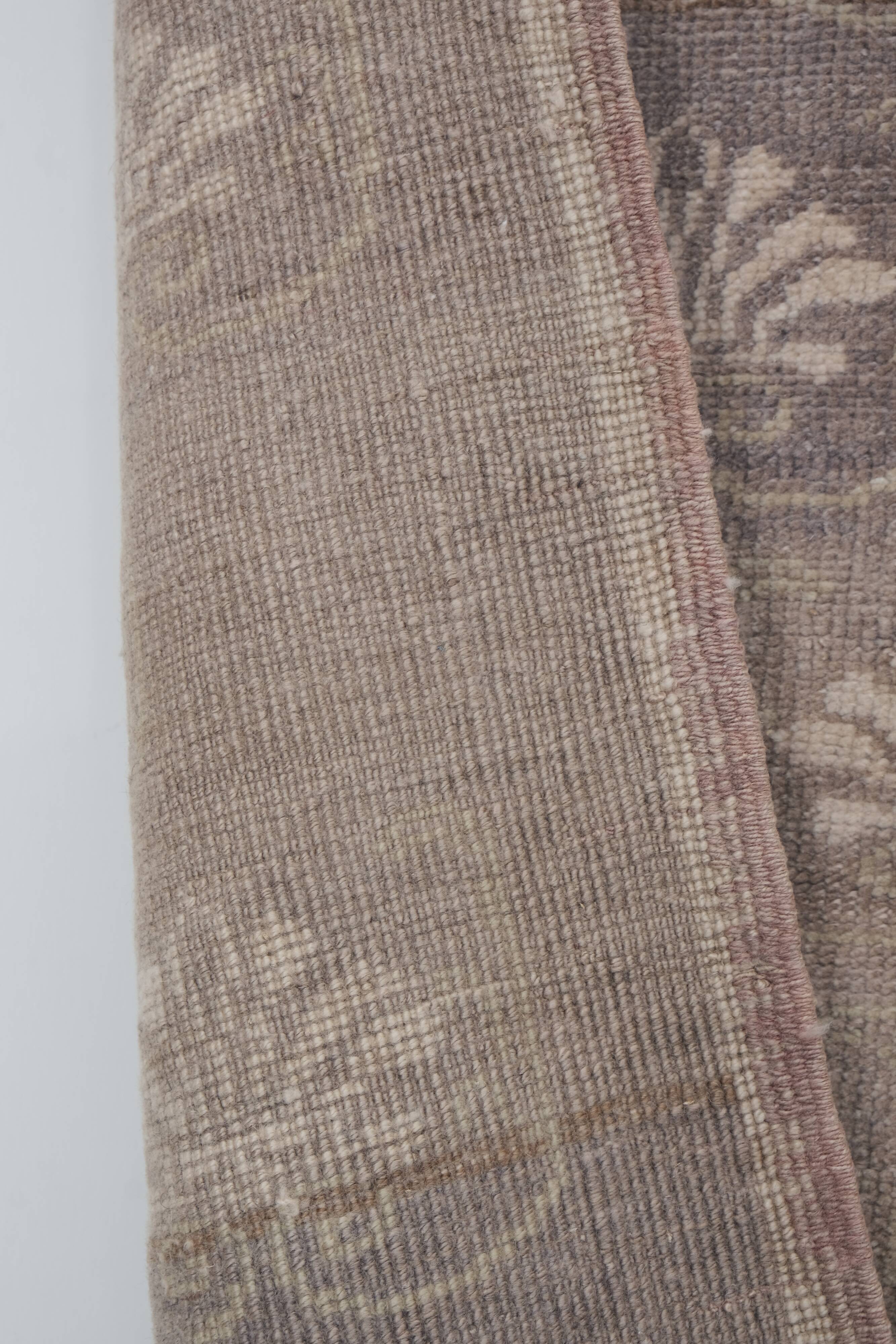 Vintage midcentury karapinar floral brown wool rug