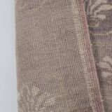 Vintage midcentury karapinar floral brown wool rug