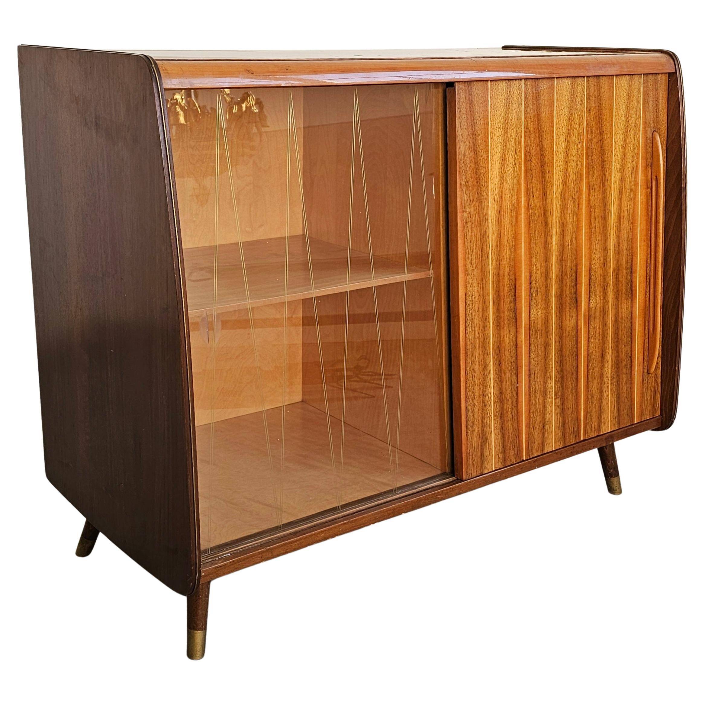 Mid-Century Modern walnut buffet with two compartments.
