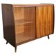 Mid-Century Modern walnut buffet with two compartments.