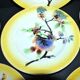 Orchies set of 6 yellow earthenware dessert plates with stencilled fruit decoration.