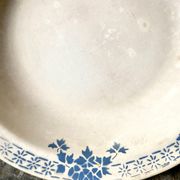 Badonviller round and hollow dish in white and blue glazed earthenware, "Verdun" service