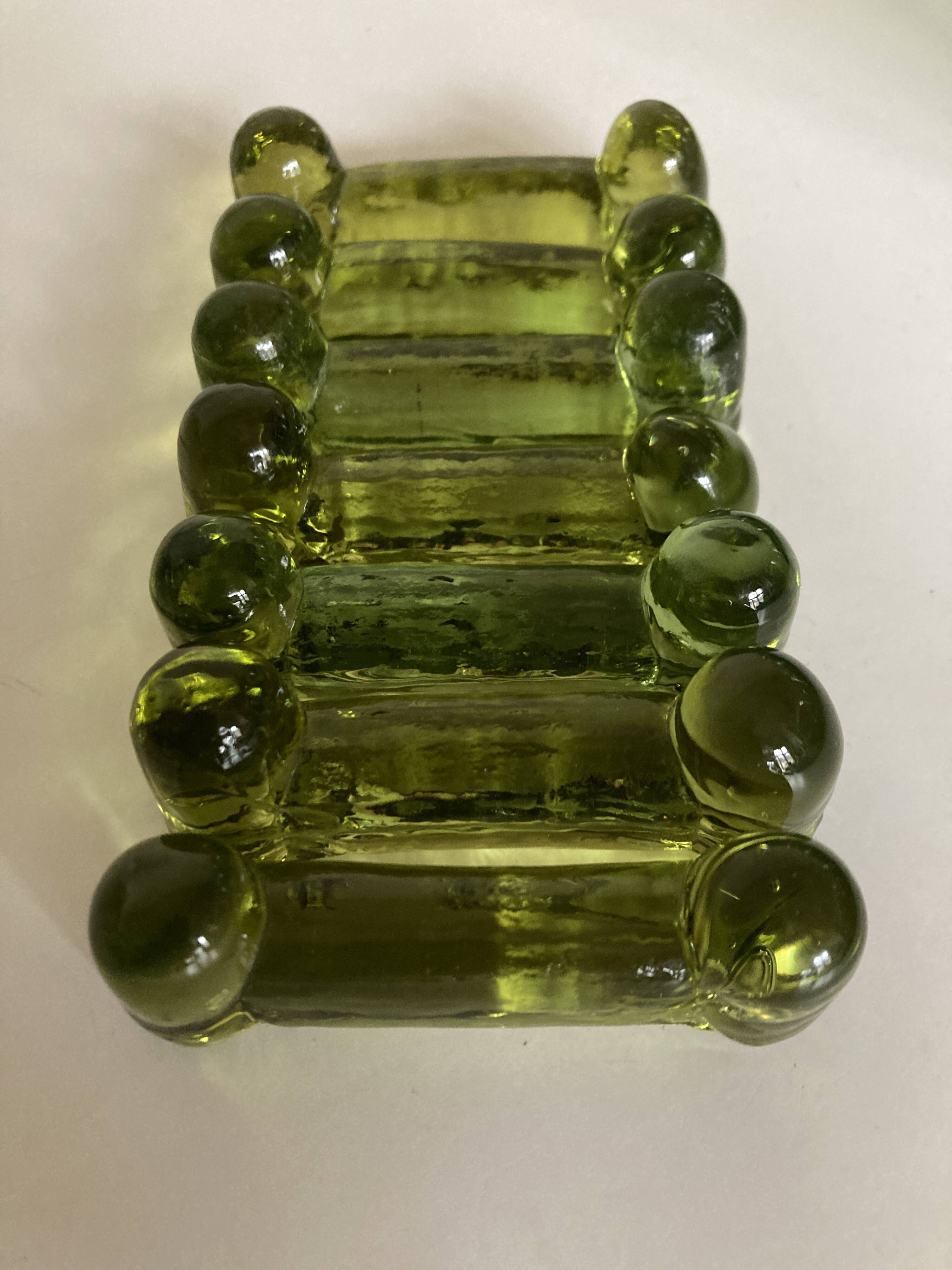 Set of 7 peridot green Biot glass knife holders 1970
