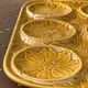 Vintage ochre earthenware artichoke dish, 6 compartments, relief flowers.