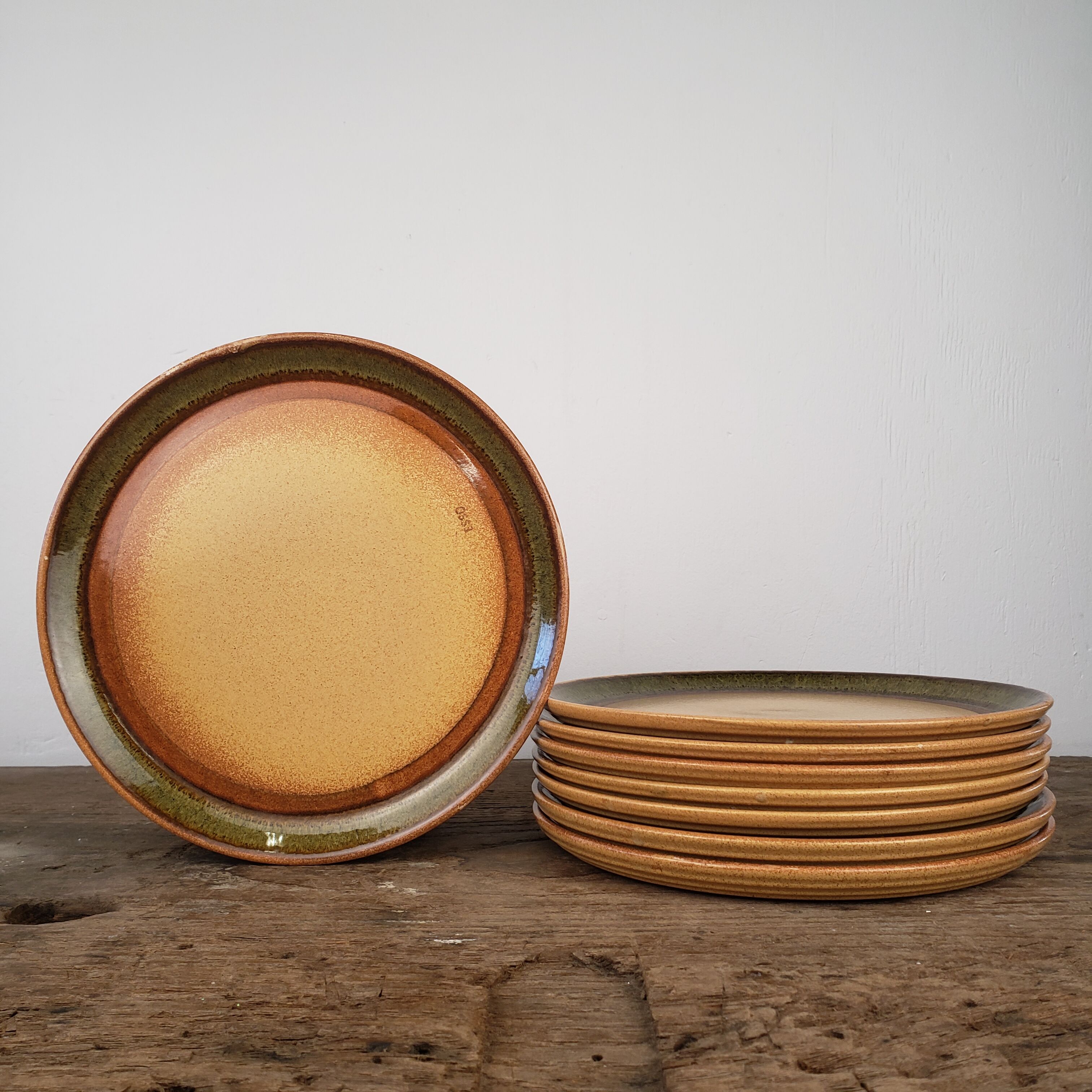8 flat stoneware plates