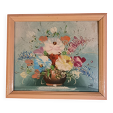 Oil painting of a bouquet of flowers.