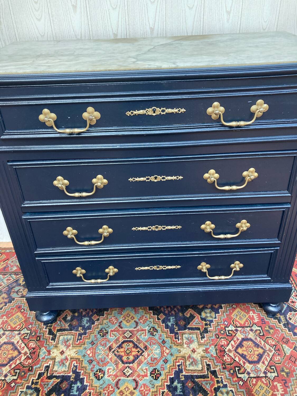 Chest of drawers with marble