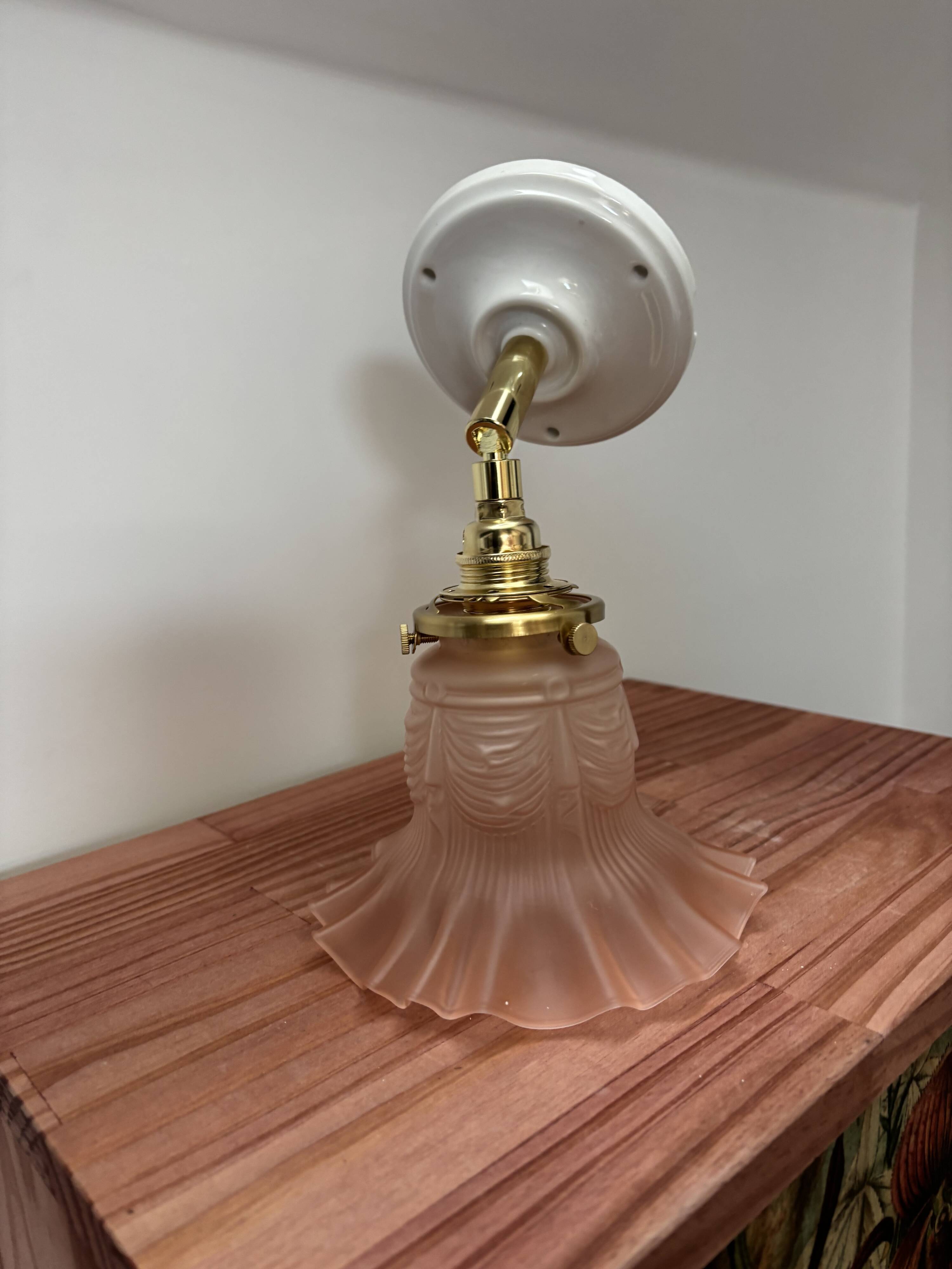 Gold and pink wall light