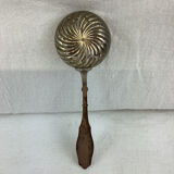 Old sprinkling spoon