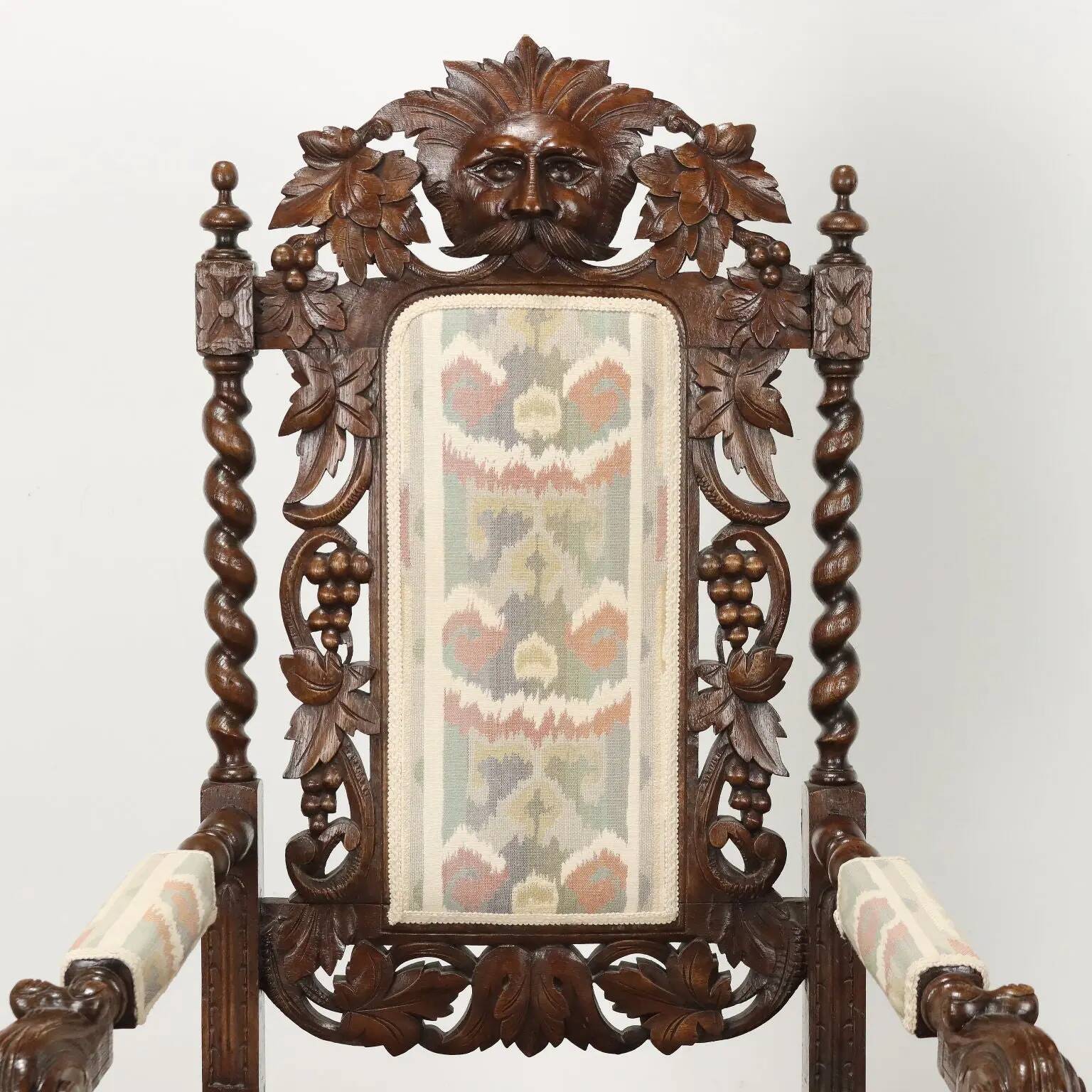 Antique Neo-Renaissance armchair in oak and fabric, 19th-20th century.