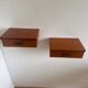 Vintage Scandinavian teak wall-mounted bedside tables.