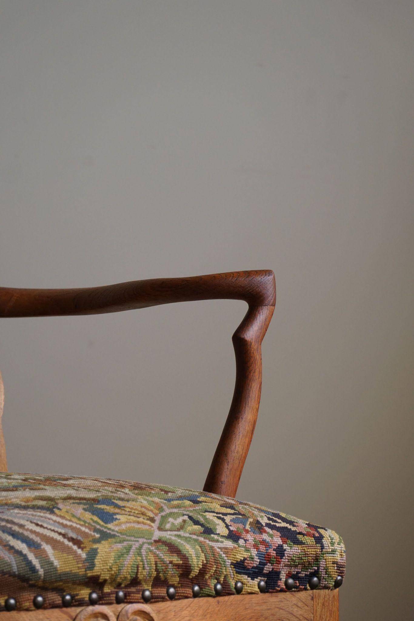 Classic Baroque style armchair in oak, made by a Danish cabinetmaker, 1930s.