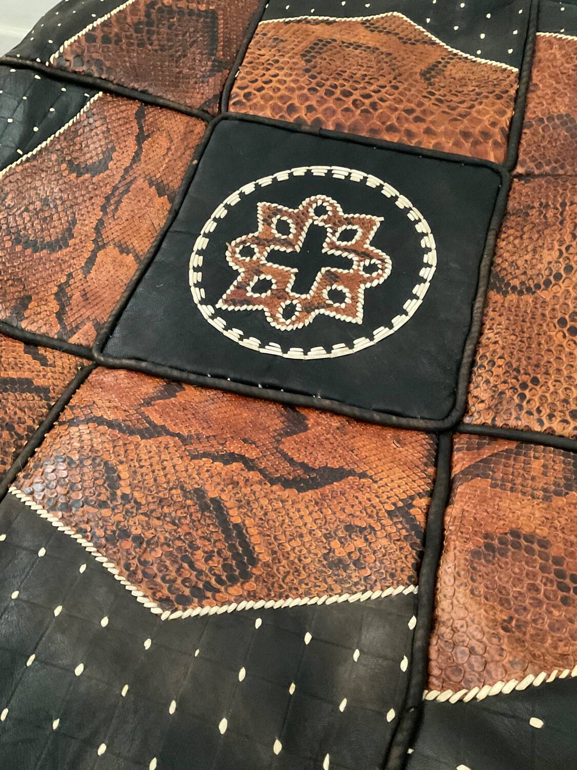 Vintage leather and snakeskin pouf