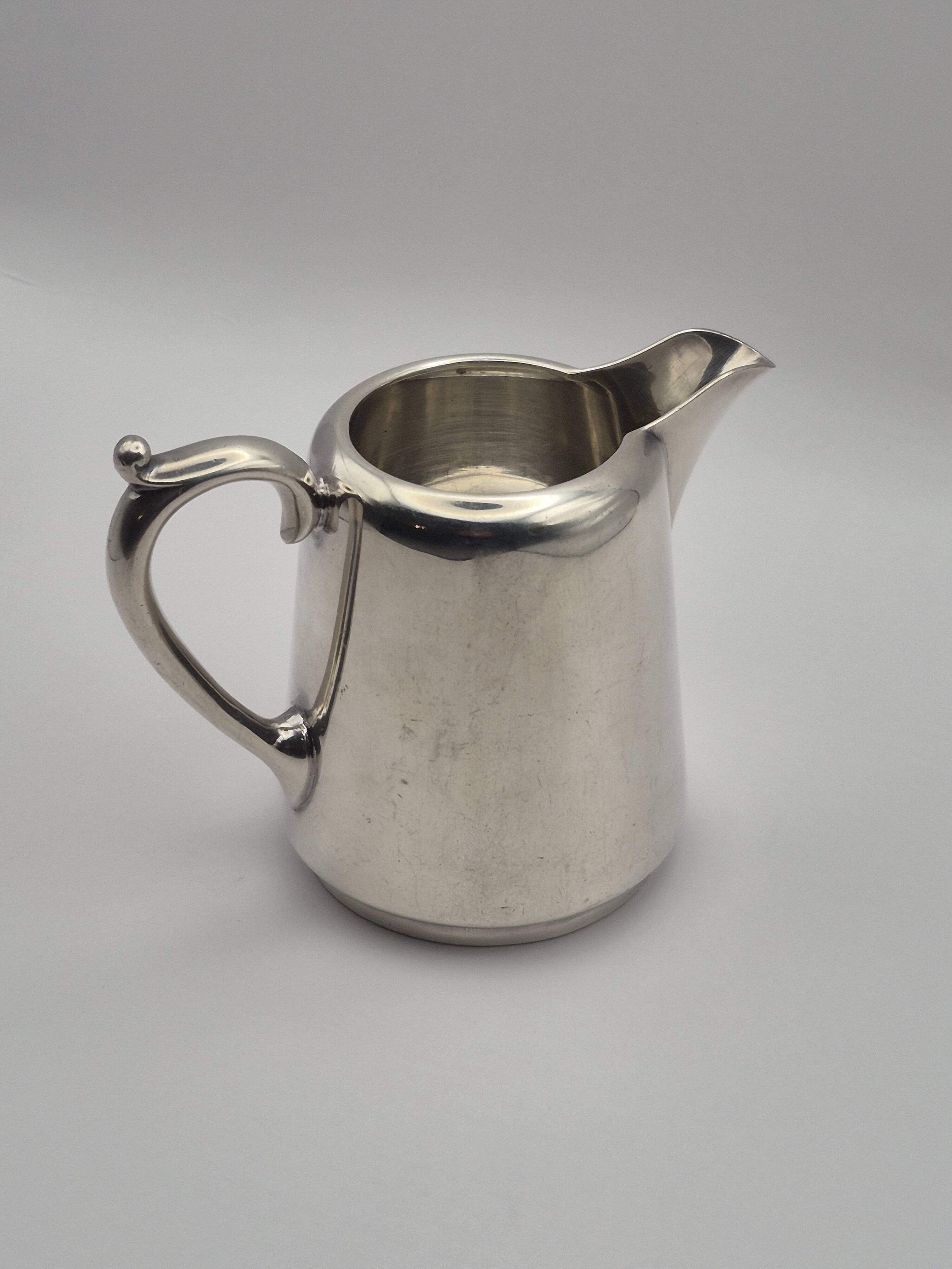 Superb vintage cream jug from the prestigious silversmithing house.