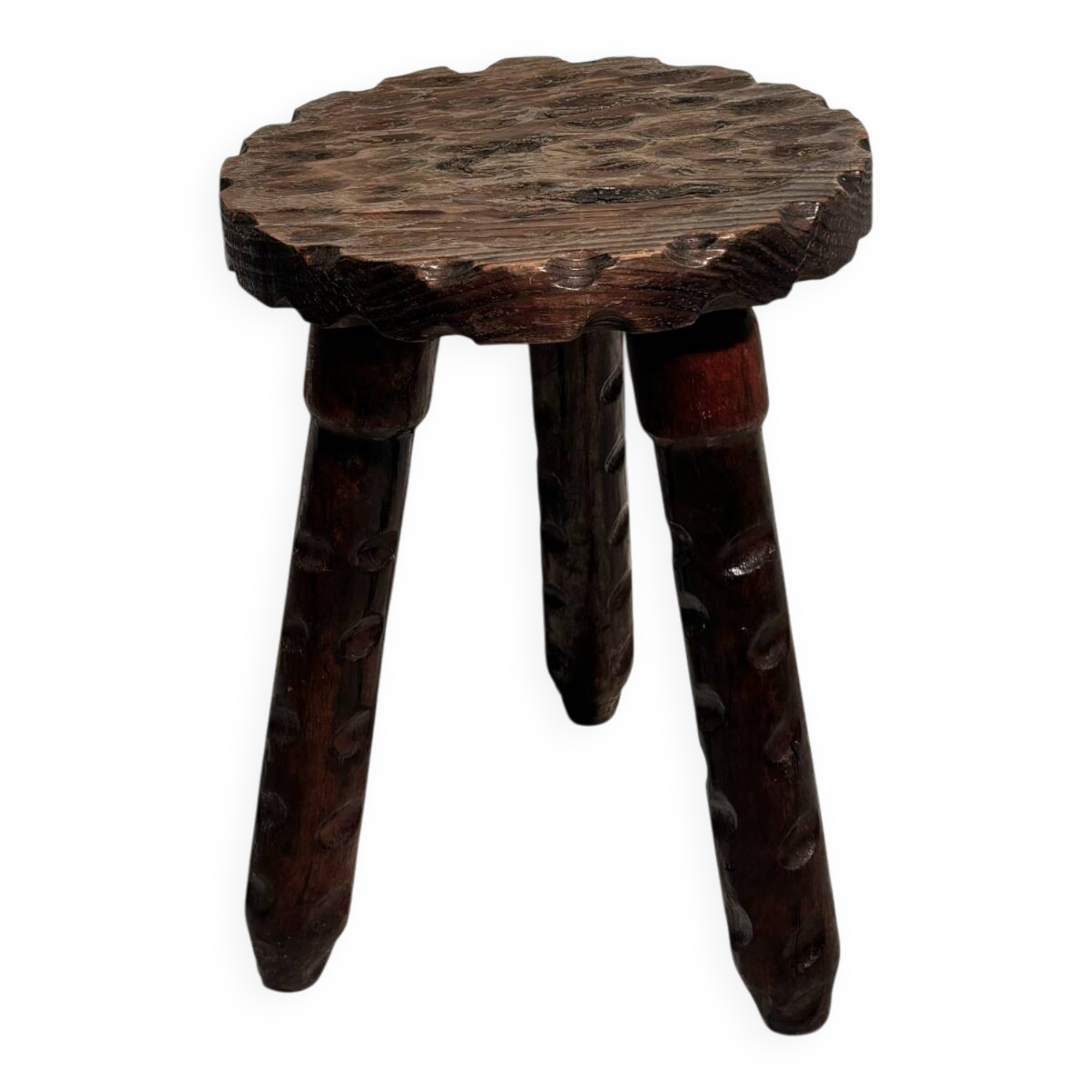 Brutalist sculpted tripod stool in solid wood — 1960s