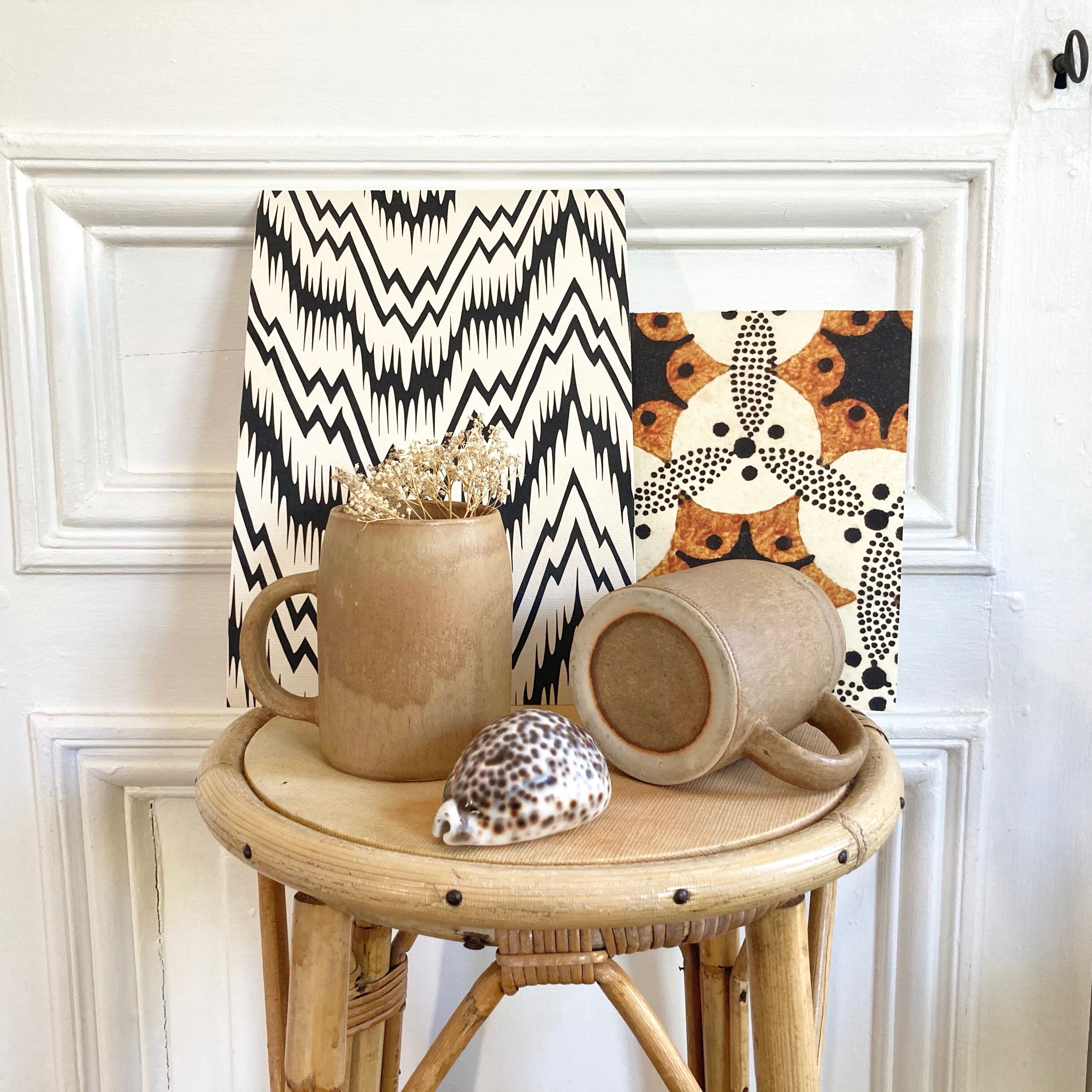 Duo of sandstone mugs